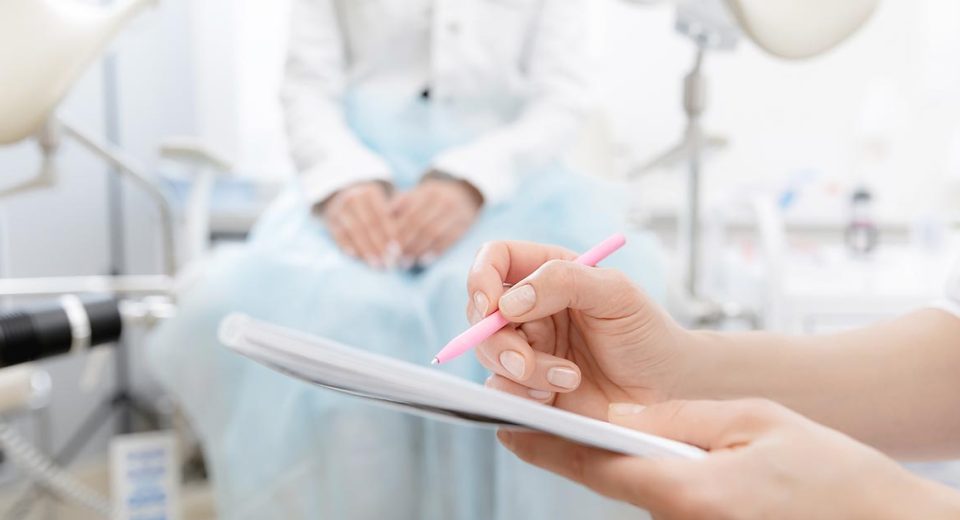 visit a gynecologist Young woman patient at gynecologist appointment consults in medical institution.