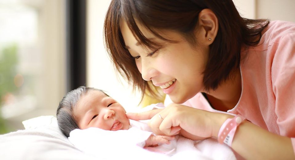 Image of newborn baby and smiling mother Image,Of,Newborn,Baby,And,Smiling,Mother