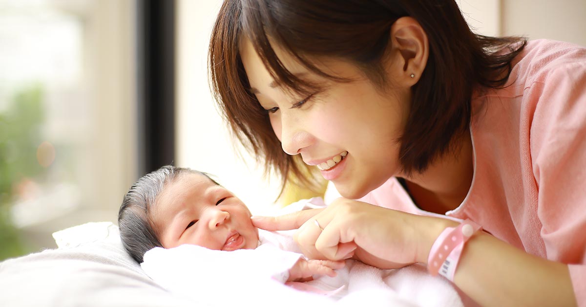 Image of newborn baby and smiling mother Image,Of,Newborn,Baby,And,Smiling,Mother